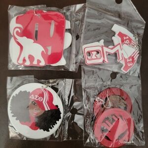 4 pair DST earrings with bonus DST make up bag